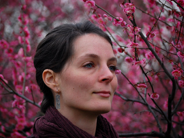 Me in front of the pink cherry blossoms