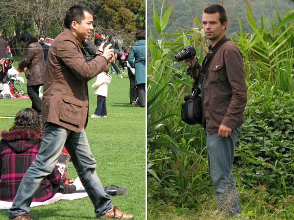 Grown out buzz cut, check. Nikon camera, check. Faded brown jacket, check. Faded blue jeans, check. The biggest thing Nik has on this guy is his amazing girlfriend.