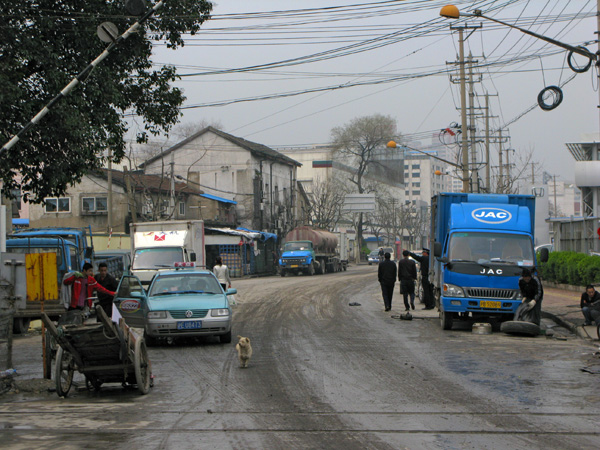 A muddy road on the way to the construction site