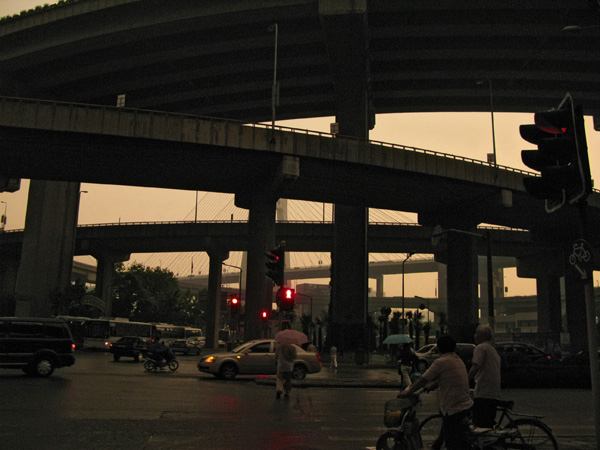 The complex clovers of highway overpasses where I decided that I must find shelter.