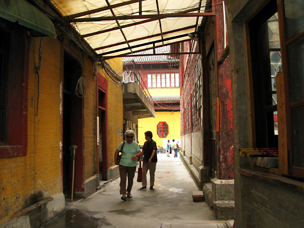 Yellow Wall at the end of an alley