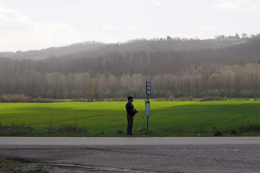 Nik at the bus stop